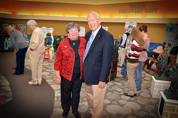 Marjorie and Eugene White smile for a photo in the White Discovery Loft, which was named for the couple.