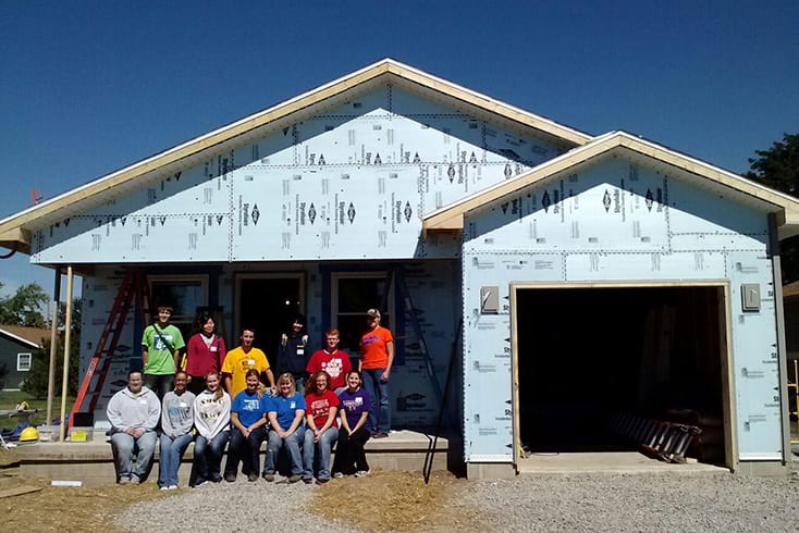 students at Habitat for Humanity site