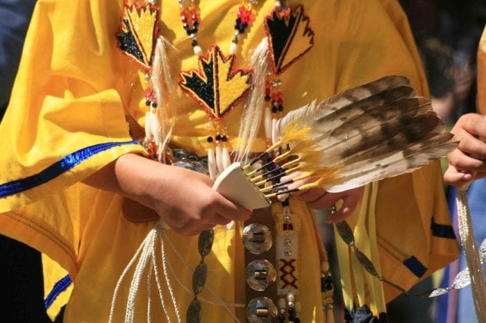 A member of the Cherokee nation, in traditional attire, by taliesin via Morguefile.com