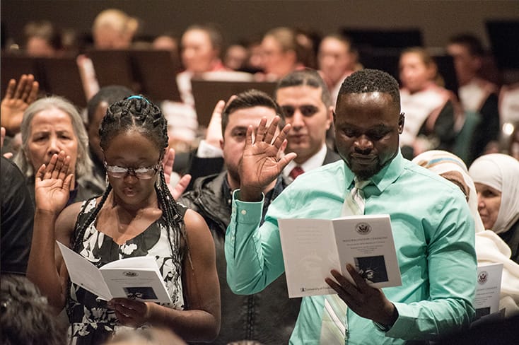 Participants taking the Oath of Citizenship