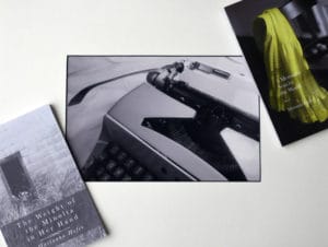 Poetry books by Findlay writer, photographer and University of Findlay professor Marianna Hofer are shown with an original photograph of the typewriter she used to type her poetry. (Photo by Courier photographer Randy Roberts).