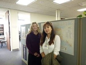 Kakshapati with an employee of the Epidemiology section of the Department of Health and Services Section of Alaska.