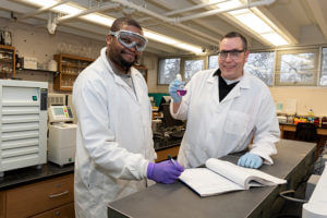 Eston Macharia, left, and Dr. Nathan Tice have formed a unique research partnership.
