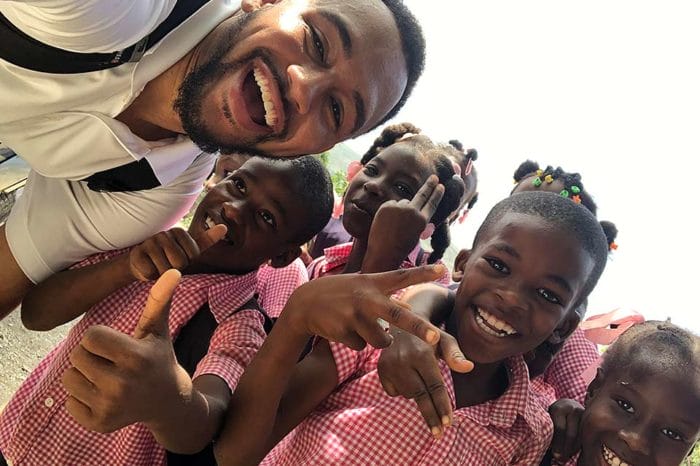 University of Findlay alumnus Ricardo Smith with students on a Mission Possible trip in May.