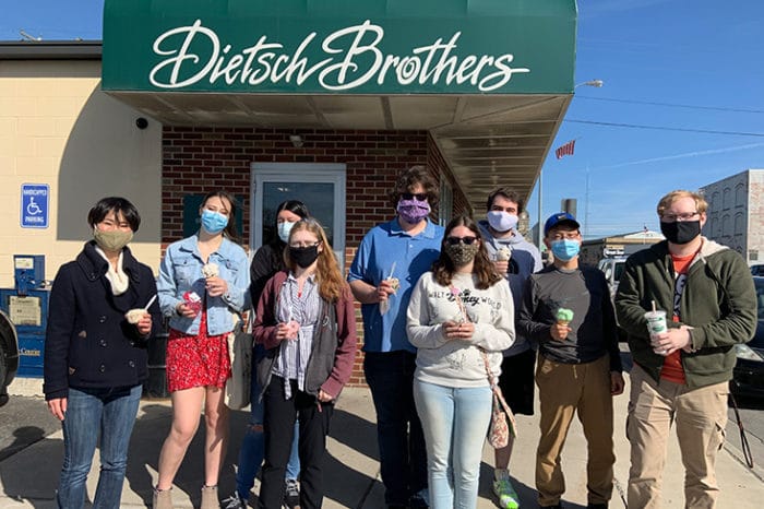 Japanese students who competed in the contest celebrate with ice cream