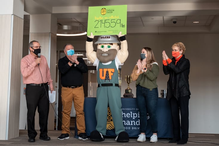 The 16th Annual Helping Hands Food Drive, organized by UF and Sodexo, shattered all expectations with a record-breaking 214,559 lbs. of food!